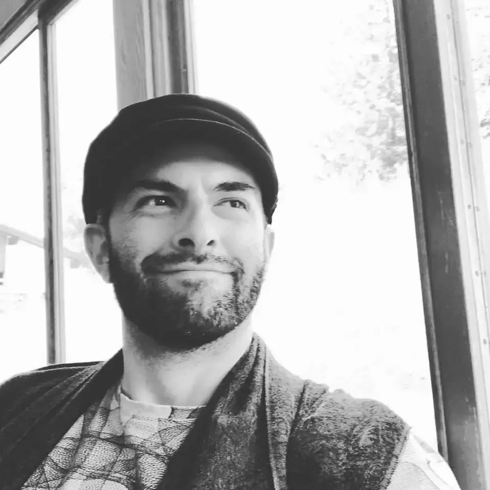Lucas smiling during a walking tour in Prague