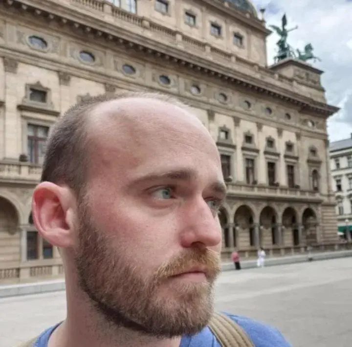 Nathan guiding a group near Charles Bridge